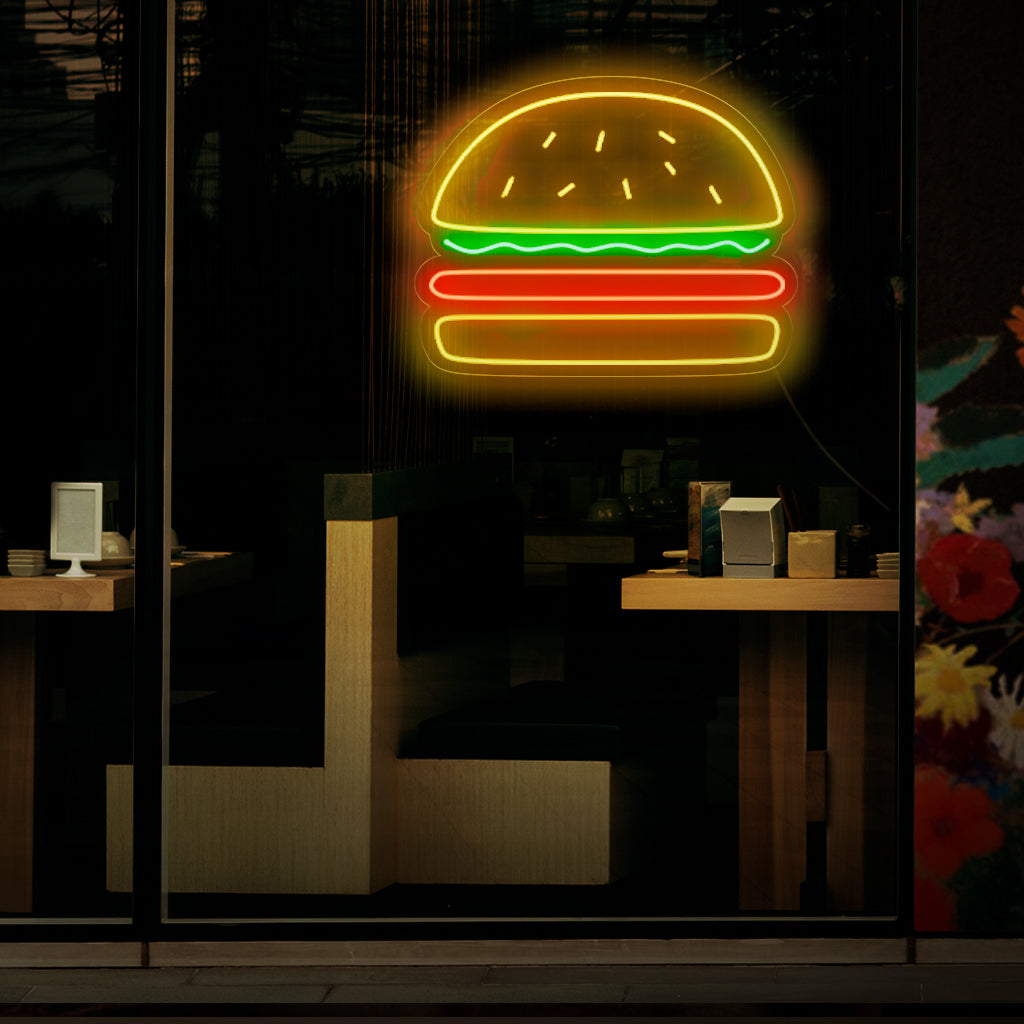 "Burger Neon Sign" - A mouthwatering neon light featuring the iconic symbol of a burger, infusing an atmosphere of deliciousness and a love for classic fast-food favorites into your burger joint or restaurant.