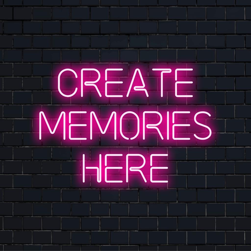 Custom LED neon sign featuring Create Memories Here in vibrant script, perfect for personalized ambiance creation.