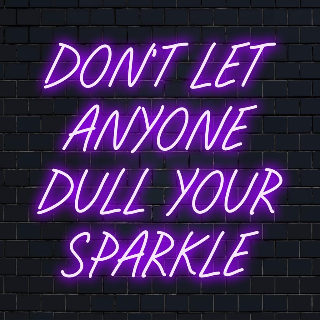 Custom LED neon sign with the empowering quote Don't Let Anyone Dull Your Sparkle, perfect for vibrant wall decor.