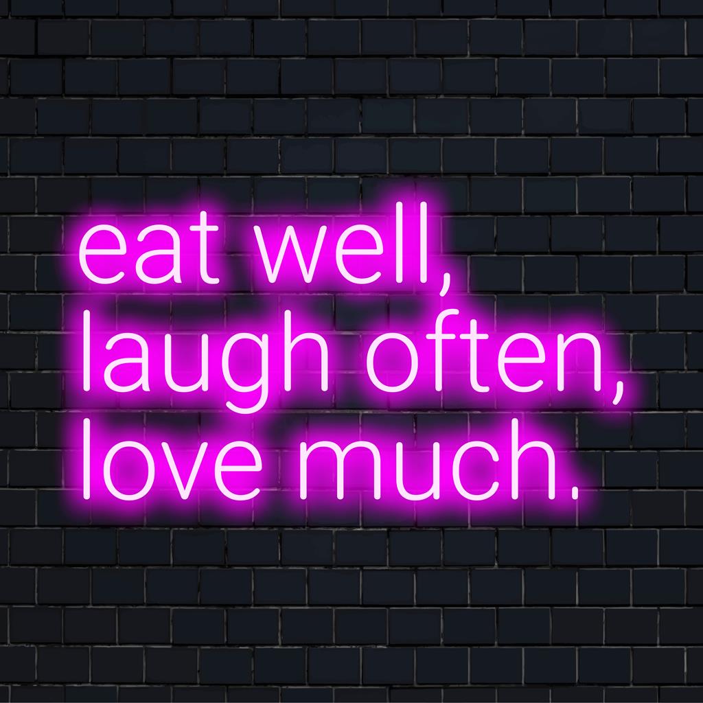 Custom LED neon sign displaying Eat Well, Laugh Often, Love Much; ideal neon quote art for home decor.