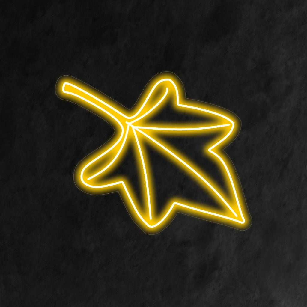 "Fall Leaf Neon Sign" lyser op med varme efterårsnuancer, perfekt til sæsonbestemt indretning og rum, der fejrer efterårets skønhed.