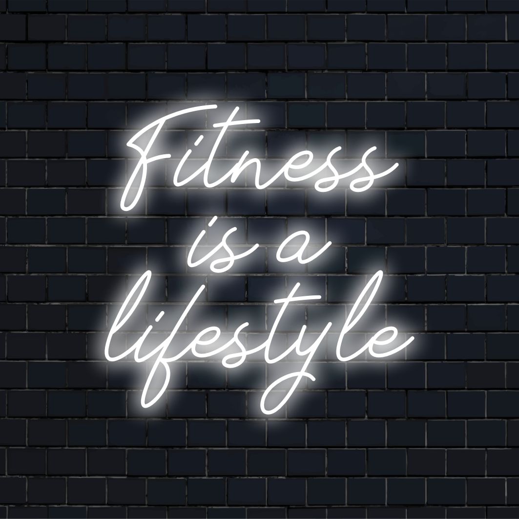 Unique LED neon sign illuminating Fitness is a lifestyle in vibrant and bold text, ideal for adding energetic decor pizzazz.