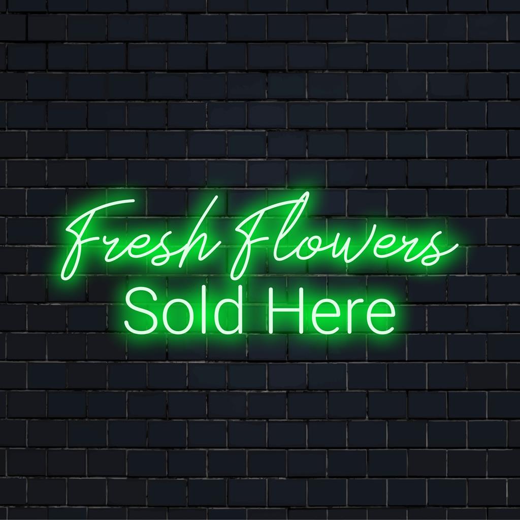 Φωτεινή και ελκυστική, αυτή η προσαρμοσμένη επιγραφή LED νέον γράφει Fresh Flowers Sold Here για μια εντυπωσιακή οθόνη λιανικής.
