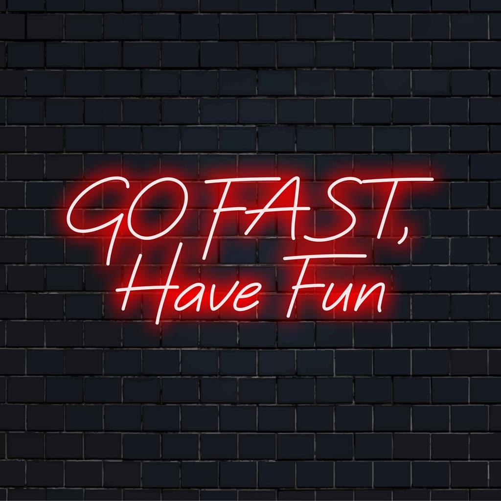 Custom LED neon sign spelling Go Fast, Have Fun, perfect for vibrant space decor and personalized lighting effects.