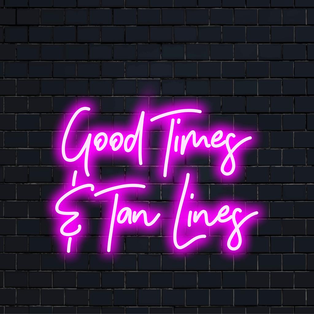 Vibrant LED neon sign reading Good Times Tan Lines; ideal for brightening spaces with unique neon light decor.