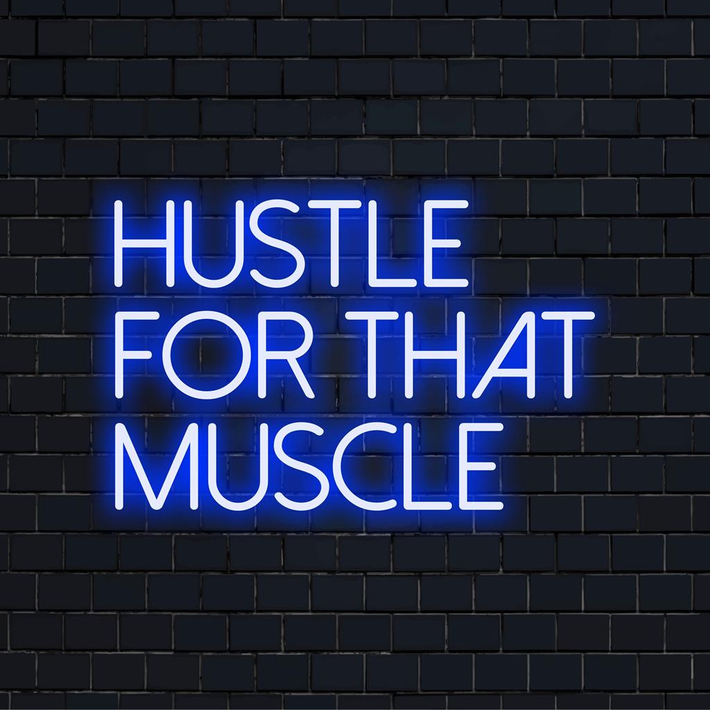 LED neon sign displaying Hustle For That Muscle in vibrant light, perfect neon decor for motivation.