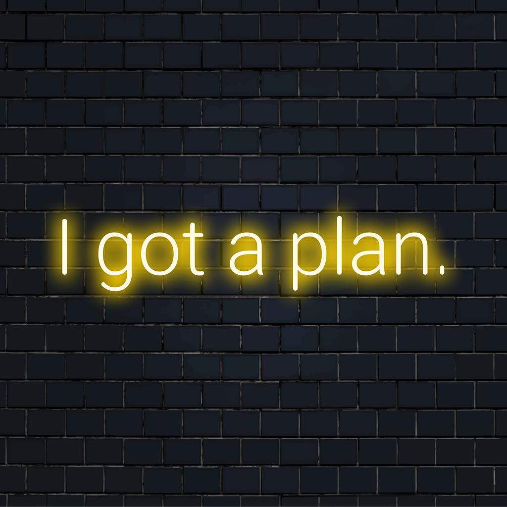 Custom made LED neon sign reading I Got A Plan in sleek font; chic neon wall art for modern spaces.