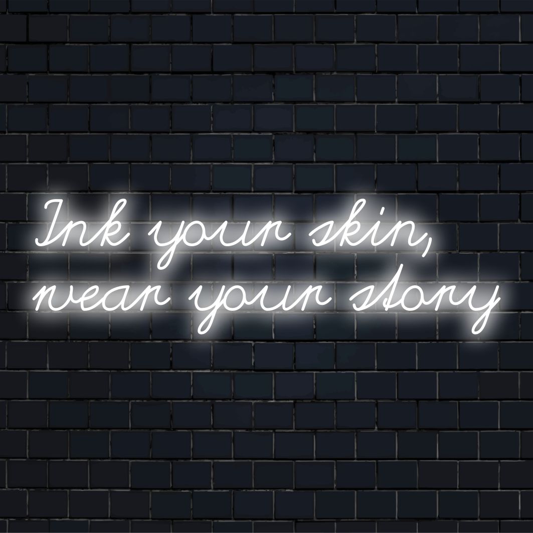 Ink Your Skin, Wear Your Story custom LED neon sign, featuring bespoke vibrant artistry to illuminate your unique message.