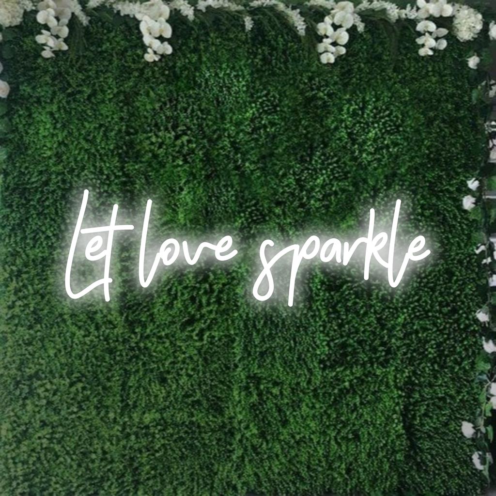 Illuminez votre espace avec l'enseigne néon LED personnalisée Let Love Sparkle, apportant une touche de chaleur et d'inspiration à n'importe quelle pièce.