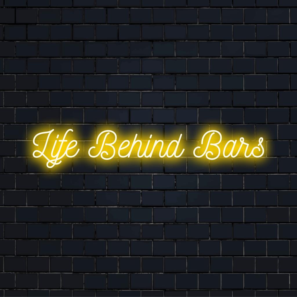 Custom-made LED neon sign reading Life Behind Bars, perfect for personal or bar decor, blending playful wit with neon elegance.