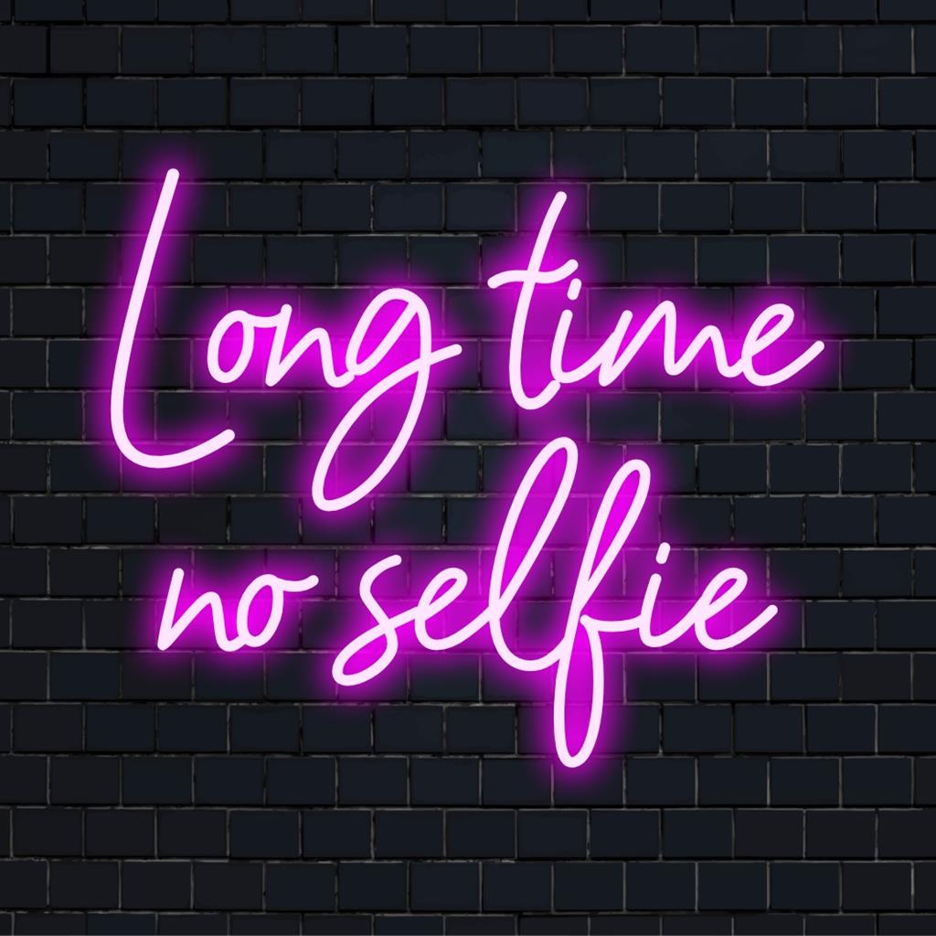Custom LED neon sign featuring hip and stylish text Long Time No Selfie, perfect for vibrant home decor, adds playful ambiance.