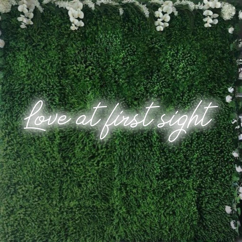 Custom made Love At First Sight LED neon sign, stunning luminous art perfect for personalized home or event decor.