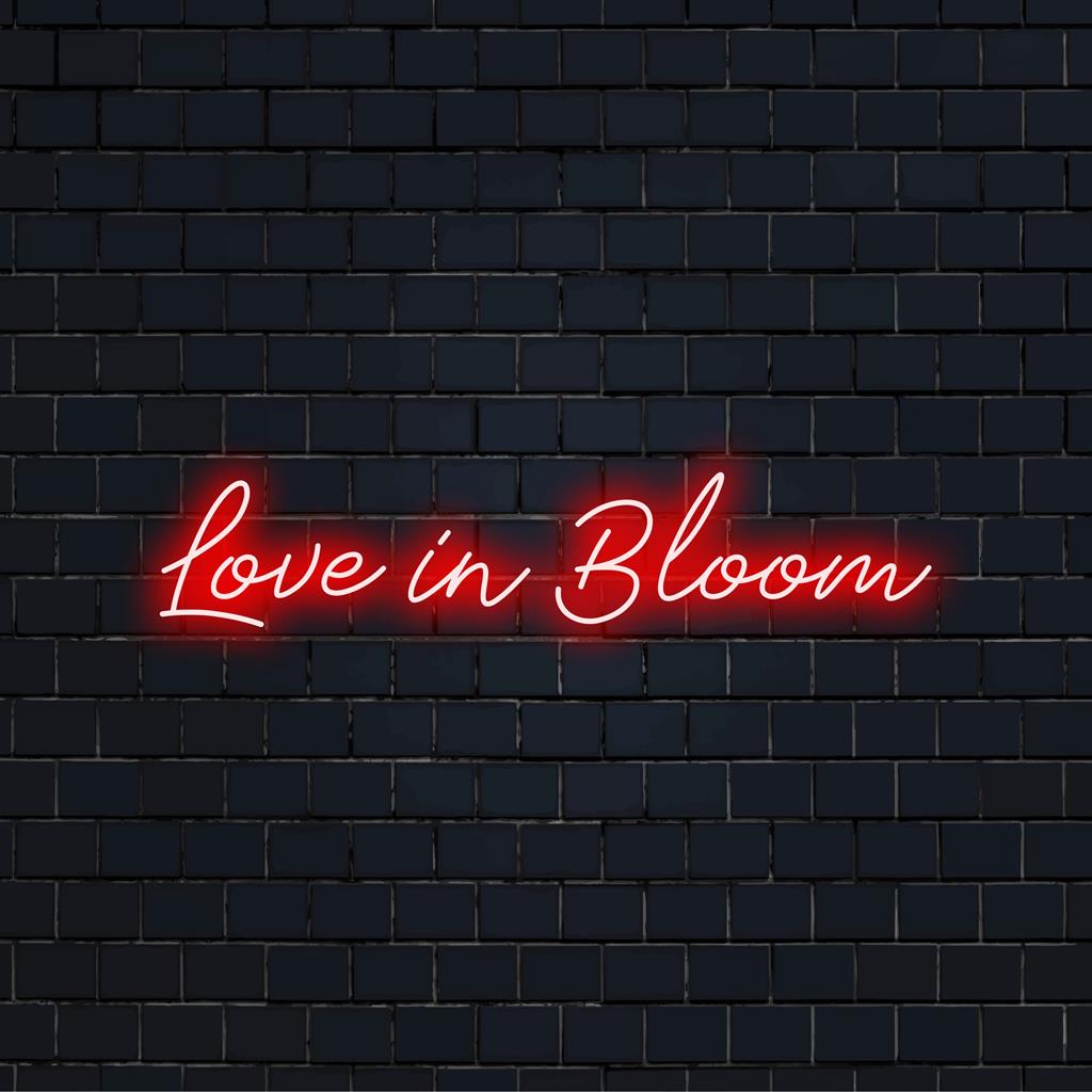 Enseigne au néon LED personnalisée par The Art Neon, avec un design vibrant Love In Bloom, parfaite pour la décoration murale au néon.