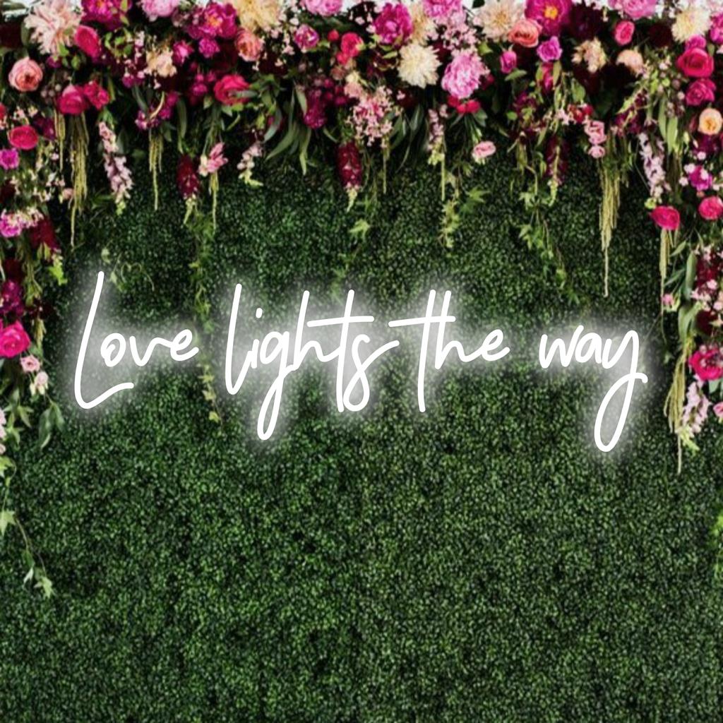 LED neon sign spelling Love Lights The Way; combines text artistry and warm glow, ideal for inspiring and illumining spaces.