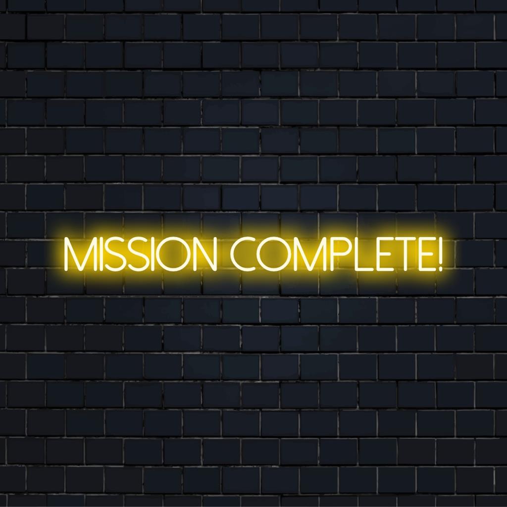 Custom LED Neon Sign in dynamic 'Mission Complete!' style; perfect neon wall art and unique décor statement.