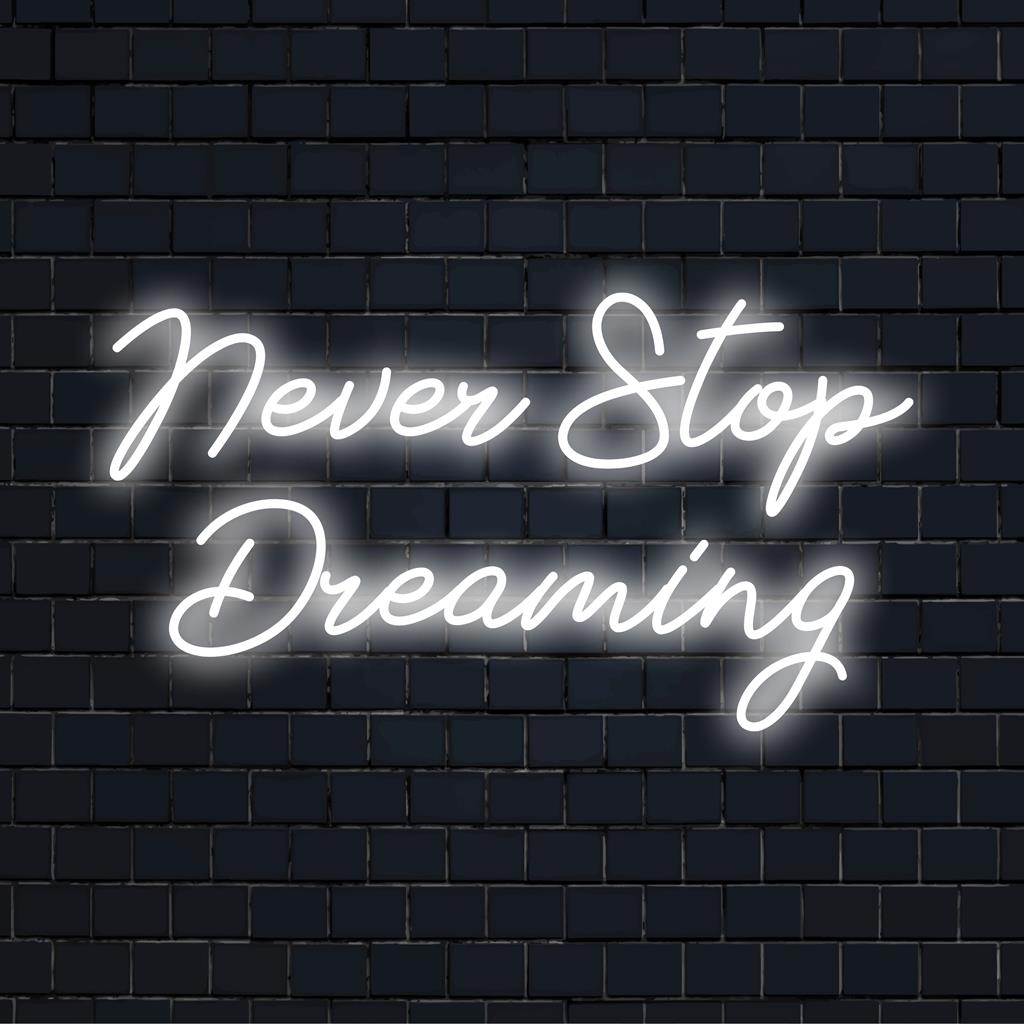 Zakázkový LED neonový nápis s nápisem Never Stop Dreaming jasným, elegantním písmem; zářivá inspirace do každé místnosti.