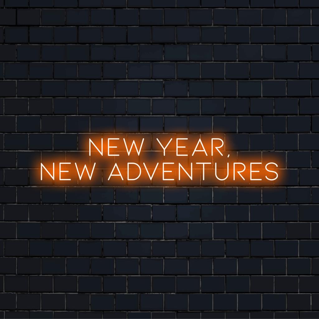 Elav LED-neoonsilt, mis valgustab teksti „Uus aasta, uued seiklused”, sobib suurepäraselt isikupärastatud seinakaunistuseks ja piduliku õhkkonna loomiseks.