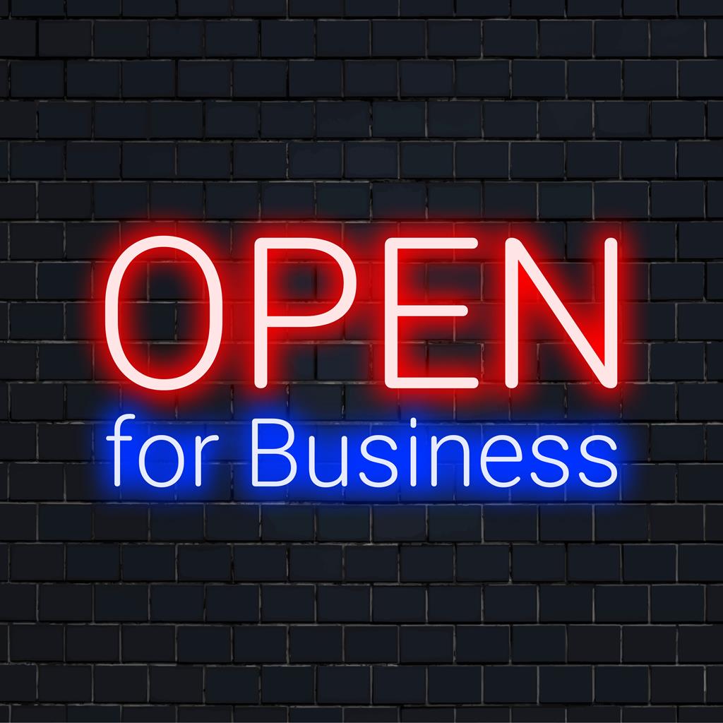 Open For Business neon sign in vibrant pink, perfect for storefronts; an inviting LED statement piece.