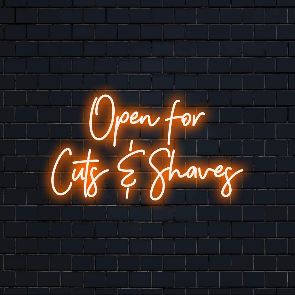 LED neon sign displaying Open For Cuts Shaves; perfect for barber shops, melding art and welcoming charm.