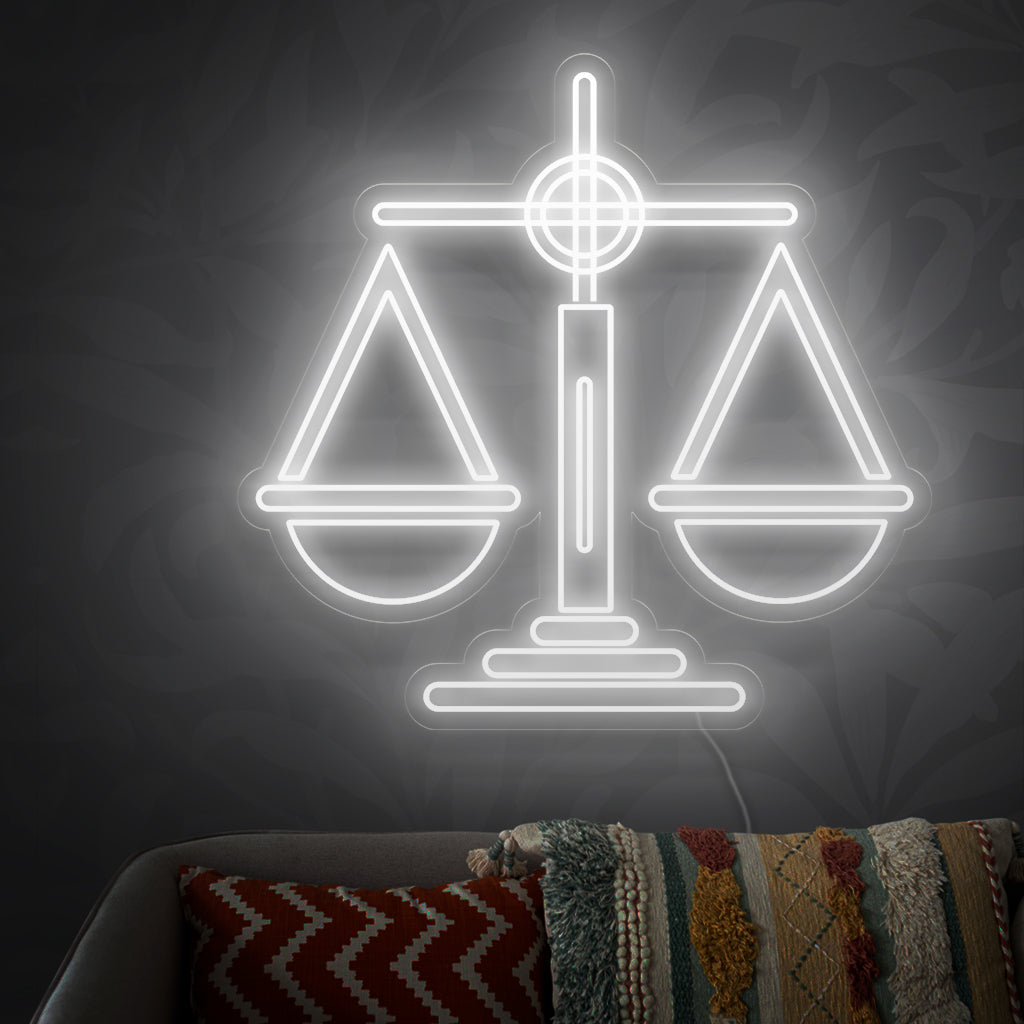 "Scales Neon Sign" symbolizes balance and justice, casting a sophisticated and harmonious glow in your space, adding an elegant touch to your decor.