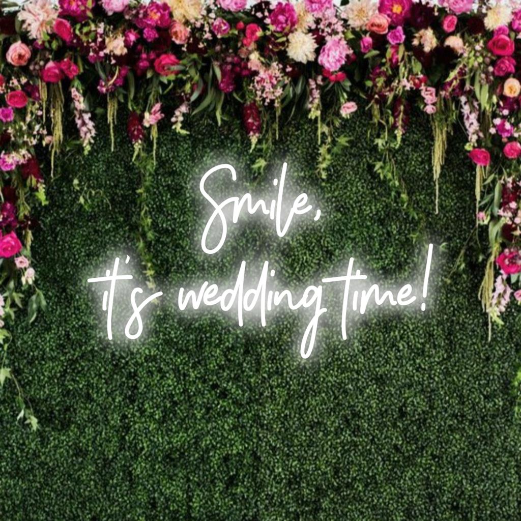 Custom LED neon sign with the phrase Smile, It's Wedding Time, perfect for wedding decor or as modern neon quote art.