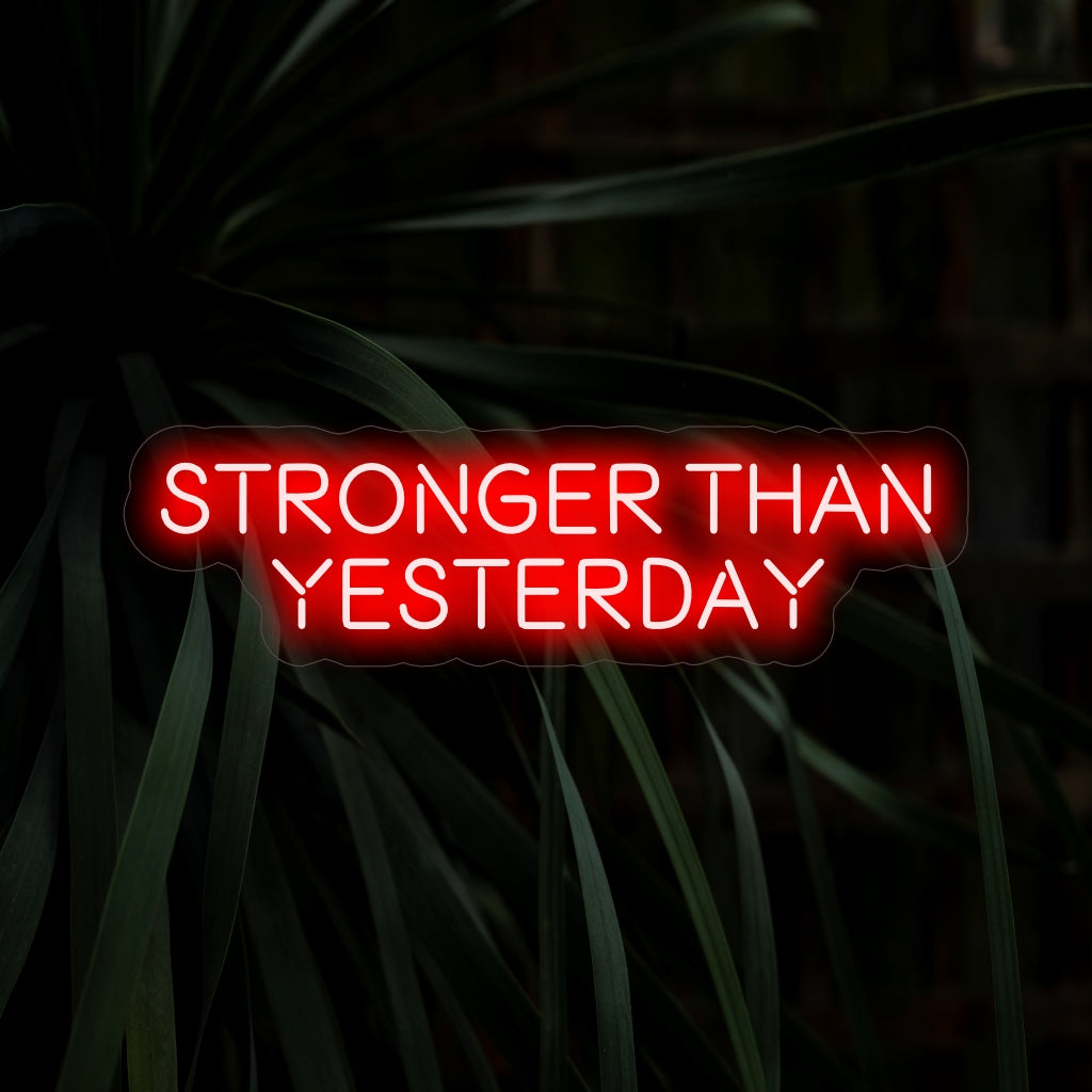 "Stronger Than Yesterday Neon Sign" radiates empowerment with its resilient mantra, casting a bold glow and creating an atmosphere that encourages strength and perseverance in your space.