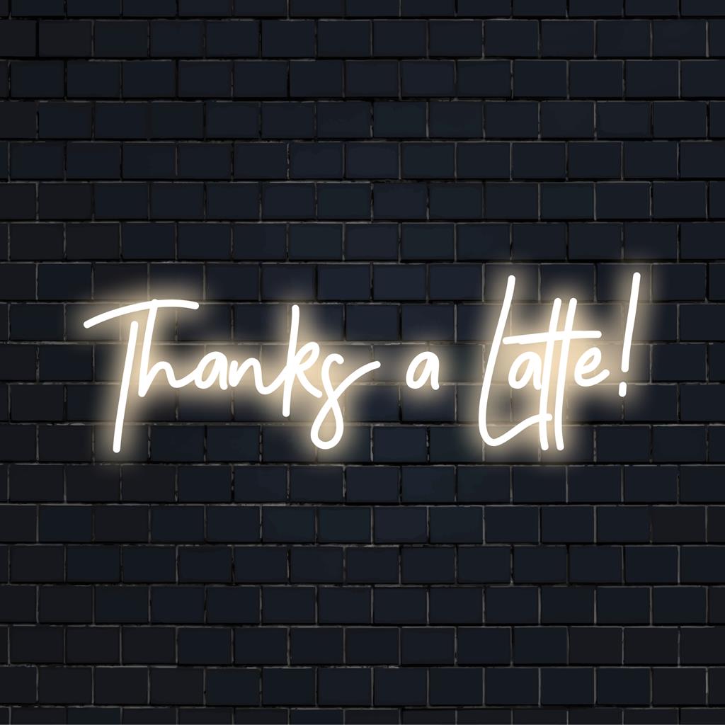 Enseigne au néon LED vibrante « Thanks A Latte ! » avec une cursive ludique, un charme de café parfait ou une pièce de décoration originale.