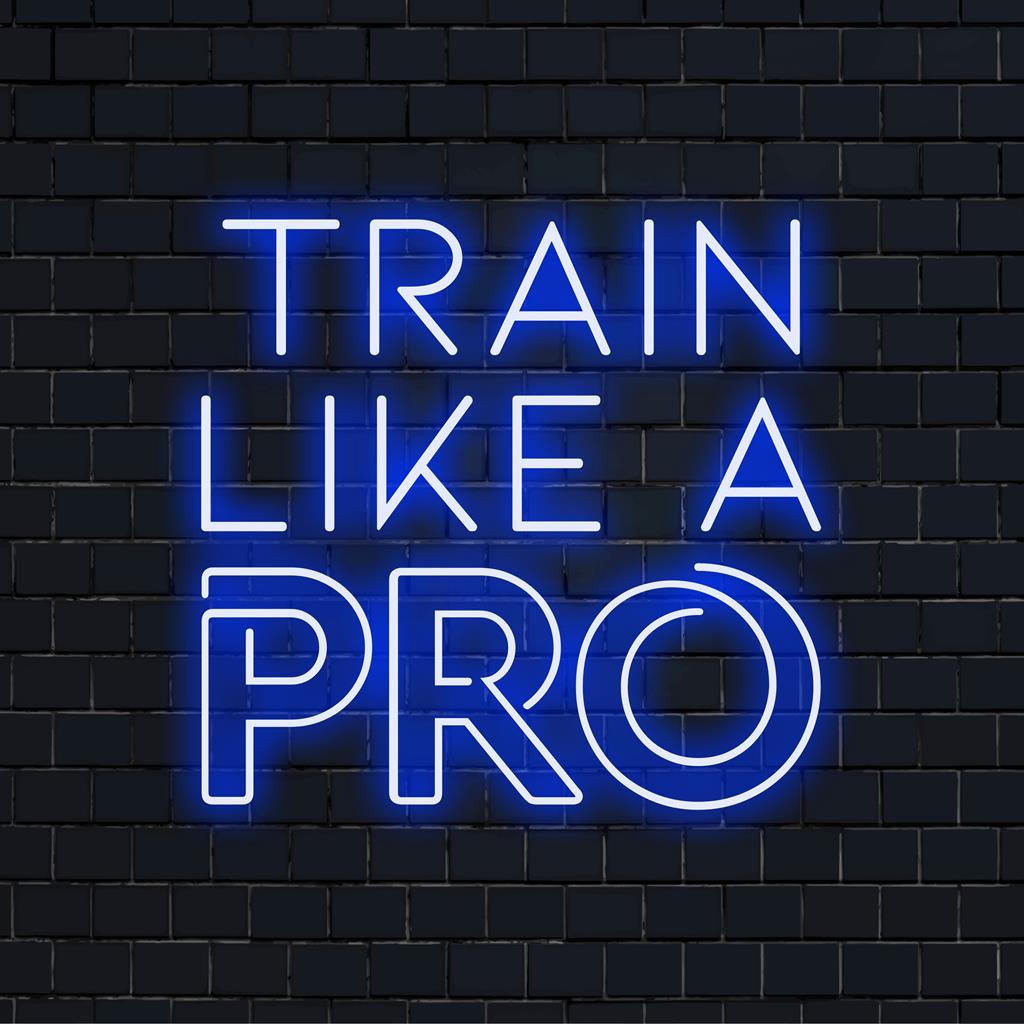 Vibrant LED neon sign displaying Train Like A Pro sends motivational vibes, perfect for any workout space. Energetic neon wall art.