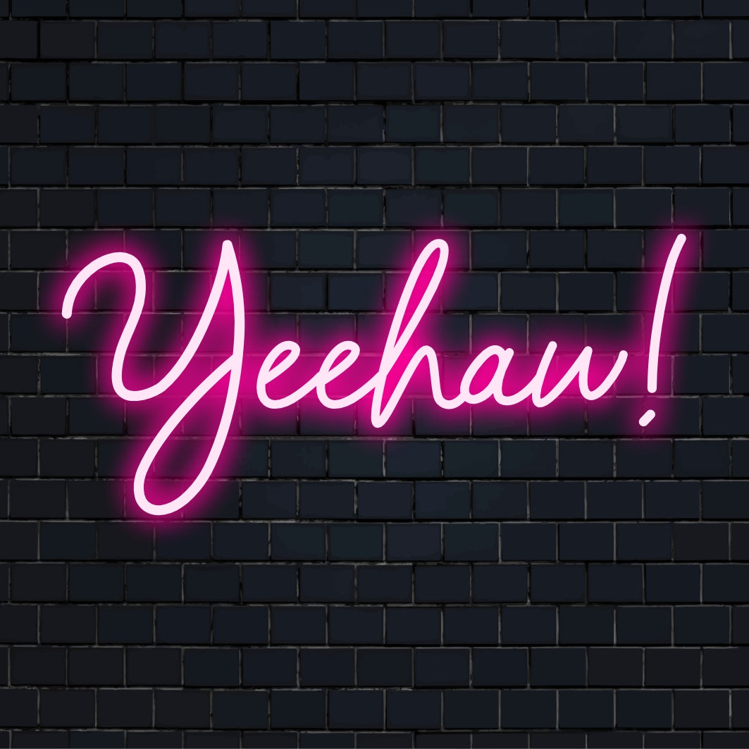 Insegna al neon LED Yeehaw luminosa e vivace, un perfetto pezzo unico fatto a mano per decorazioni esclusive o contesti celebrativi.