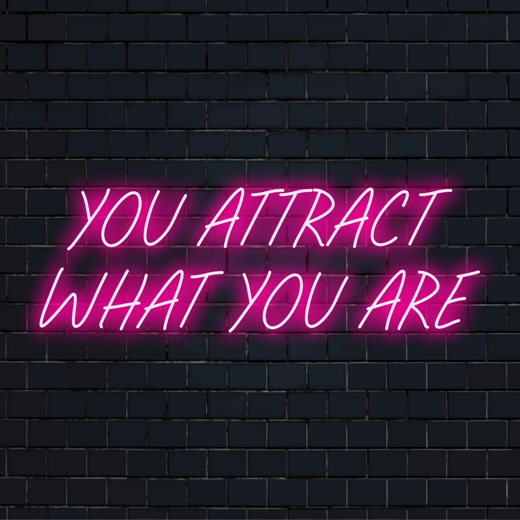 Custom-made LED neon sign featuring the phrase You Attract What You Are; a vibrant and inspiring decor piece.