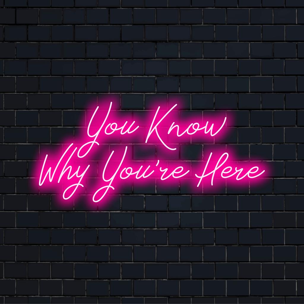 Custom LED neon sign reads You Know Why You're Here, ideal for vibrant interiors or unique signage.