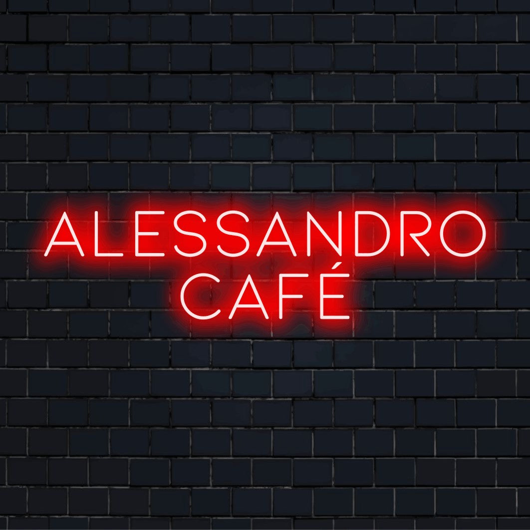 Alessandro Cafe Personalized Neon Light with soft neon glow against black brick wall