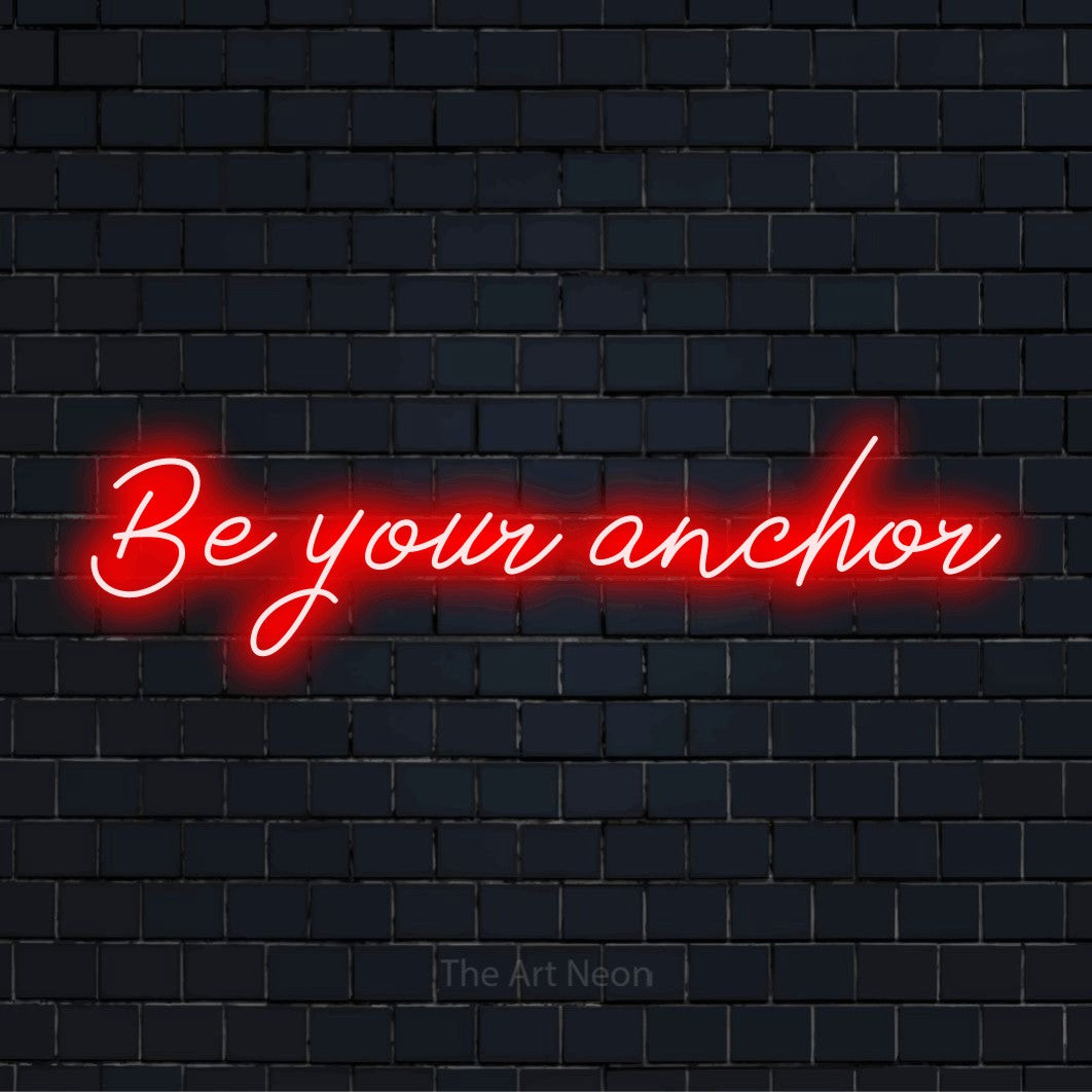 "Be Your Anchor" LED neon sign on a black brick wall