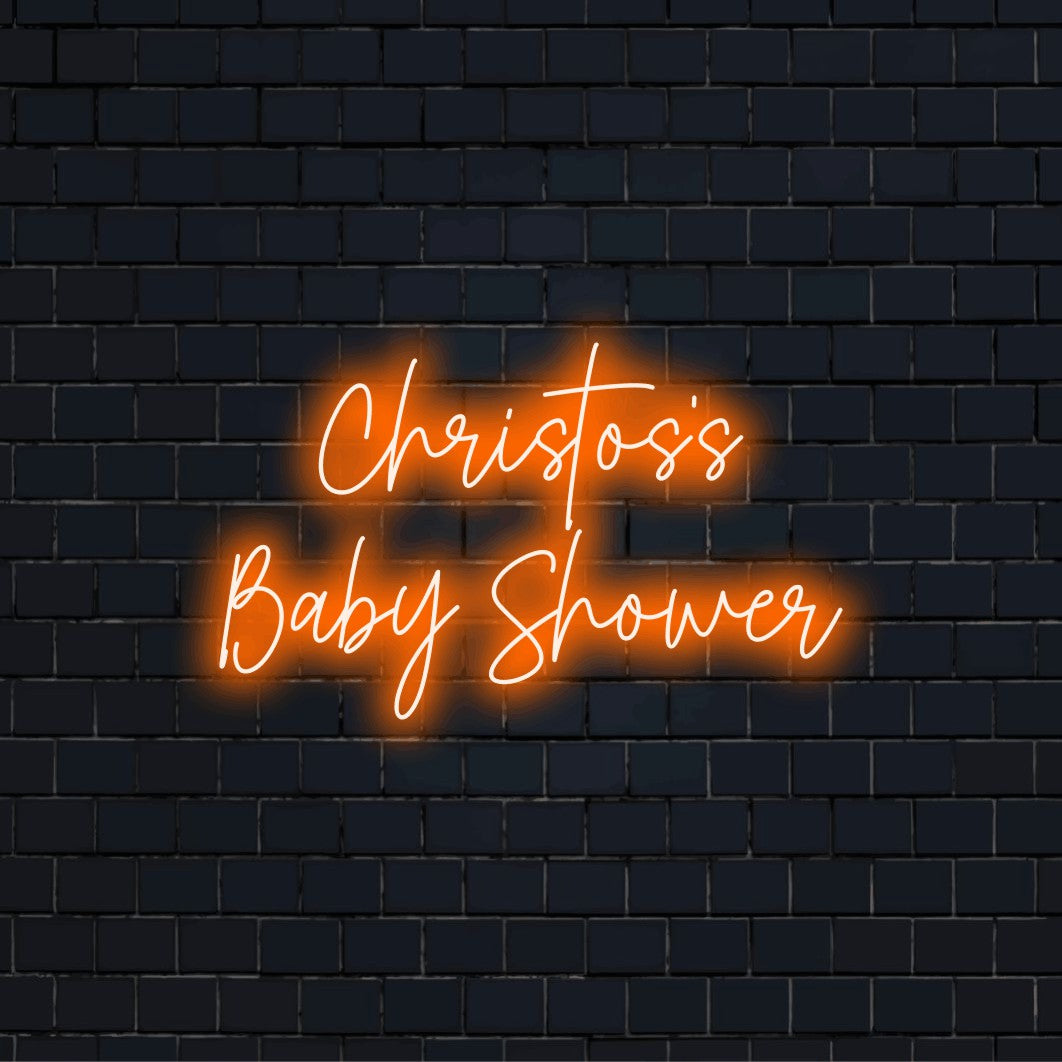 Christos_s Baby Shower Personalized Neon Light with bright LED glow against black brick wall
