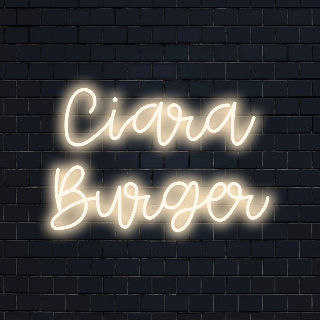 Ciara Burger Custom Name Neon Sign, bright LED glow on black brick background
