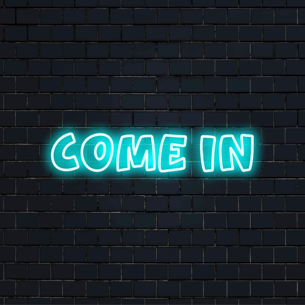Come In Neon Light with bright LED glow against black brick wall