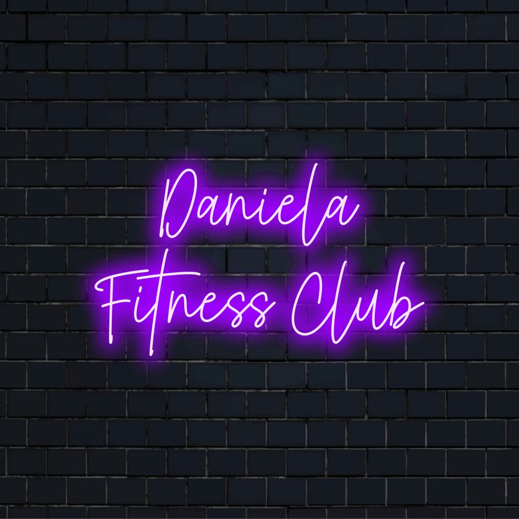 Daniela Fitness Club Personalized LED Neon Sign, glowing wall decor against brick backdrop