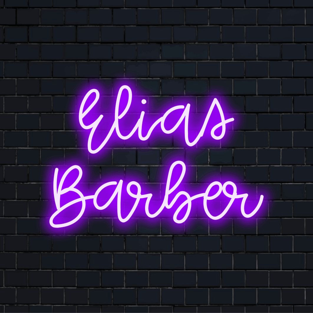 Elias Barber Personalized LED Neon Sign, glowing lettering on dark brick wall