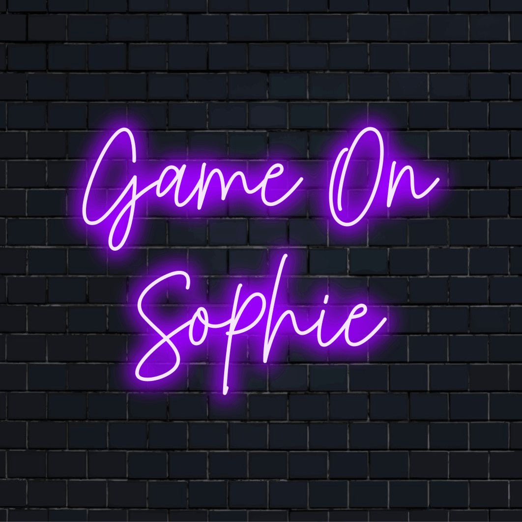 Game On Sophie Custom Name Neon Sign, bright LED glow on dark brick background