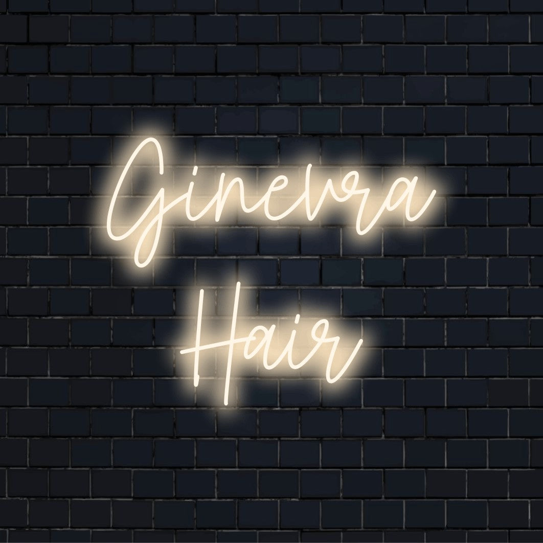 Ginevra Hair Personalized Neon Light with bright LED glow on dark brick wall