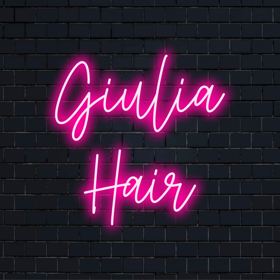 Giulia Hair Custom Name Neon Sign, bright neon glow on black brick background