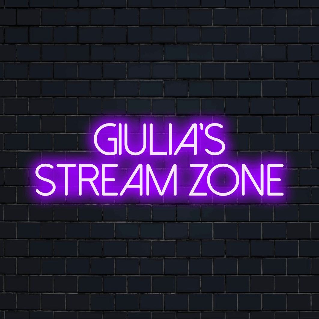 Giulia_s Stream Zone Personalized Neon Light with bright neon glow on dark brick wall