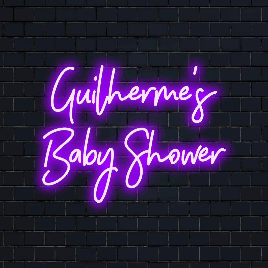 Guilherme_s Baby Shower Custom Name Neon Sign, glowing lettering on dark brick background