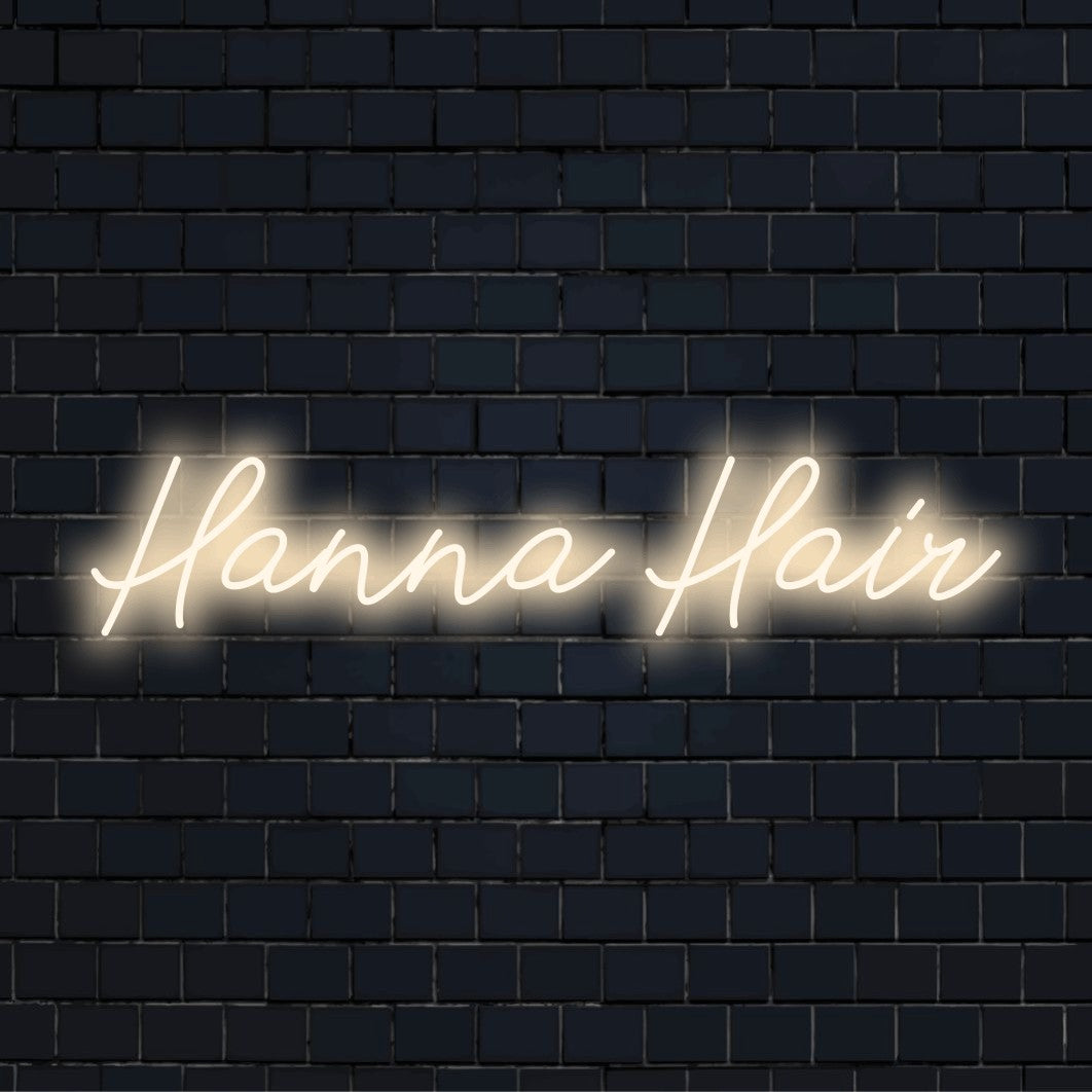 Hanna Hair Custom Name Neon Sign, bright LED glow against brick backdrop