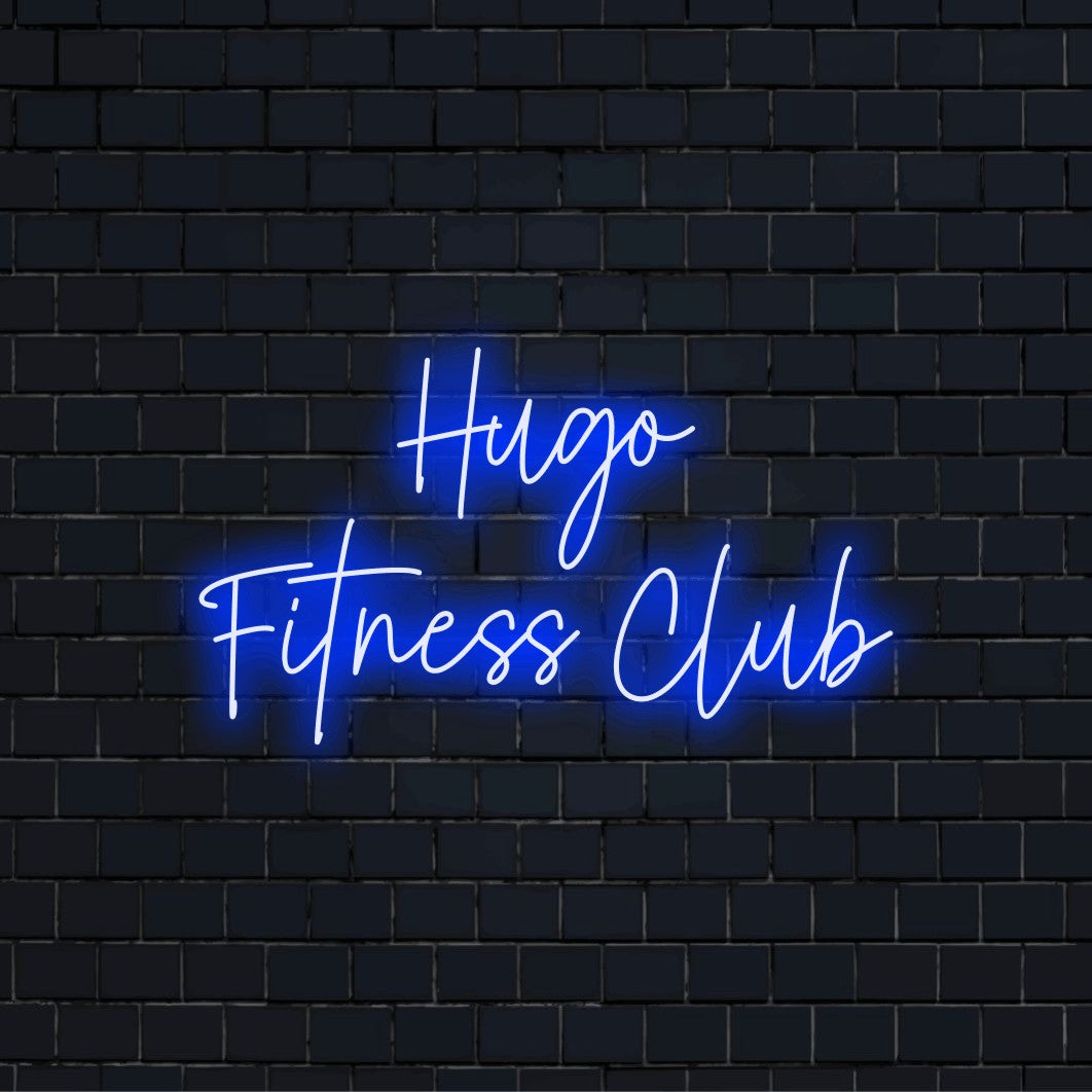 Hugo Fitness Club Personalized Neon Light with neon text light against brick backdrop