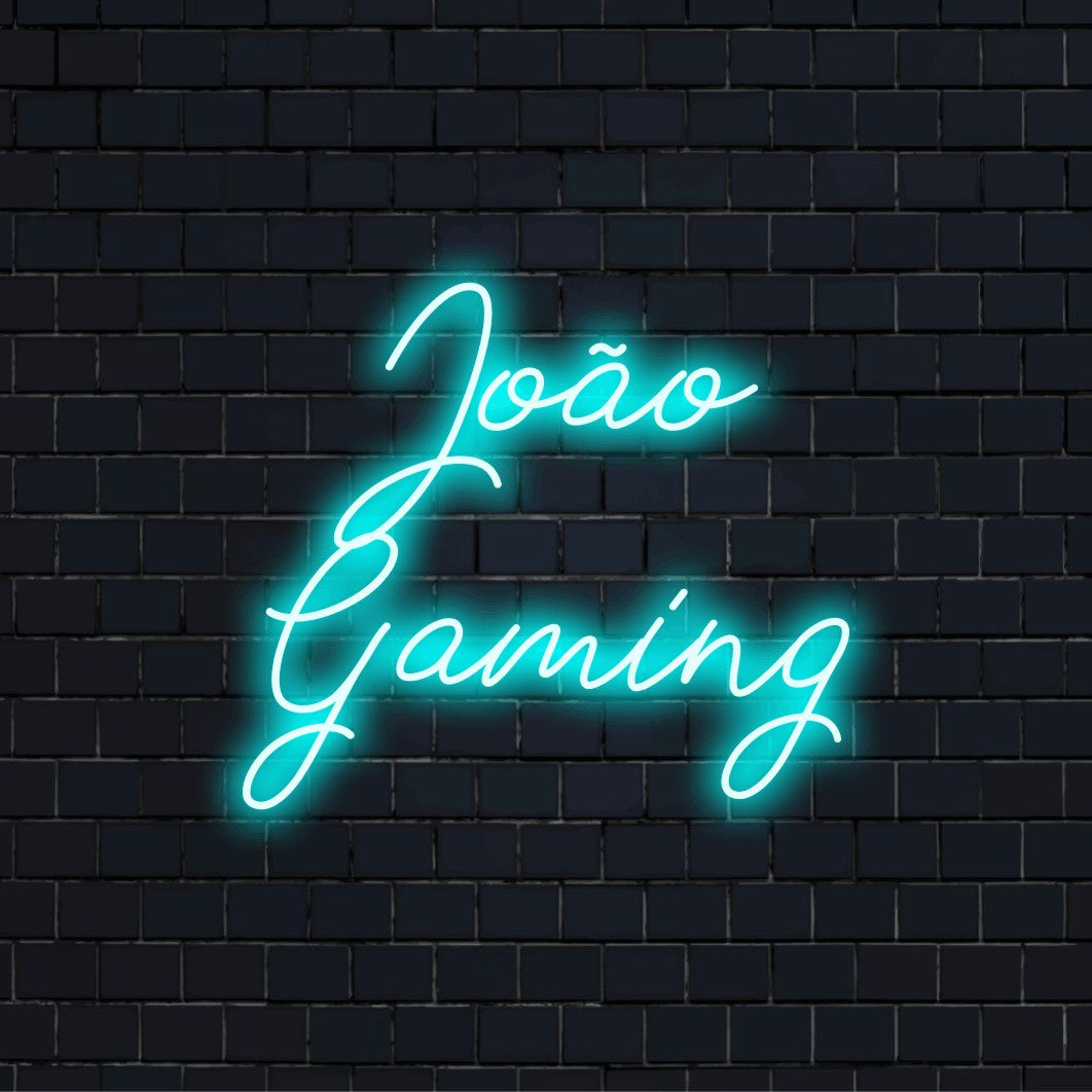 Joao Gaming Personalized LED Neon Sign, bright LED glow on dark brick wall