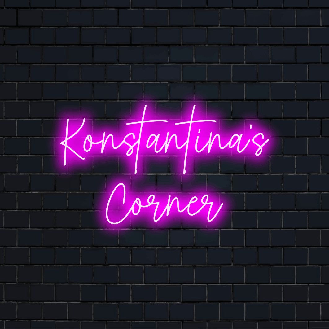 Konstantina_s Corner Personalized Neon Light with bright LED glow against black brick wall