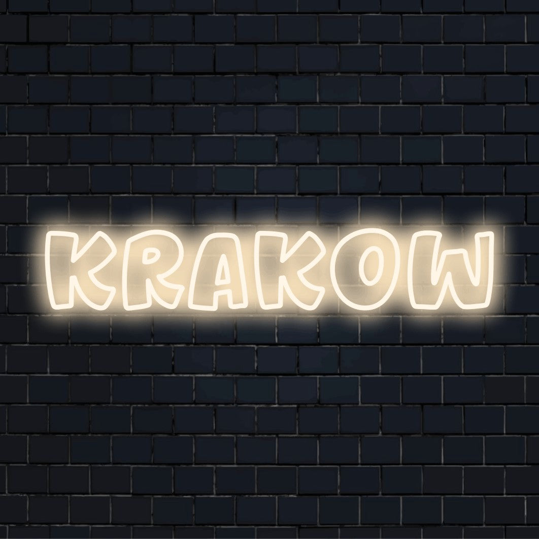 Krakow Neon Sign, neon text light against brick backdrop