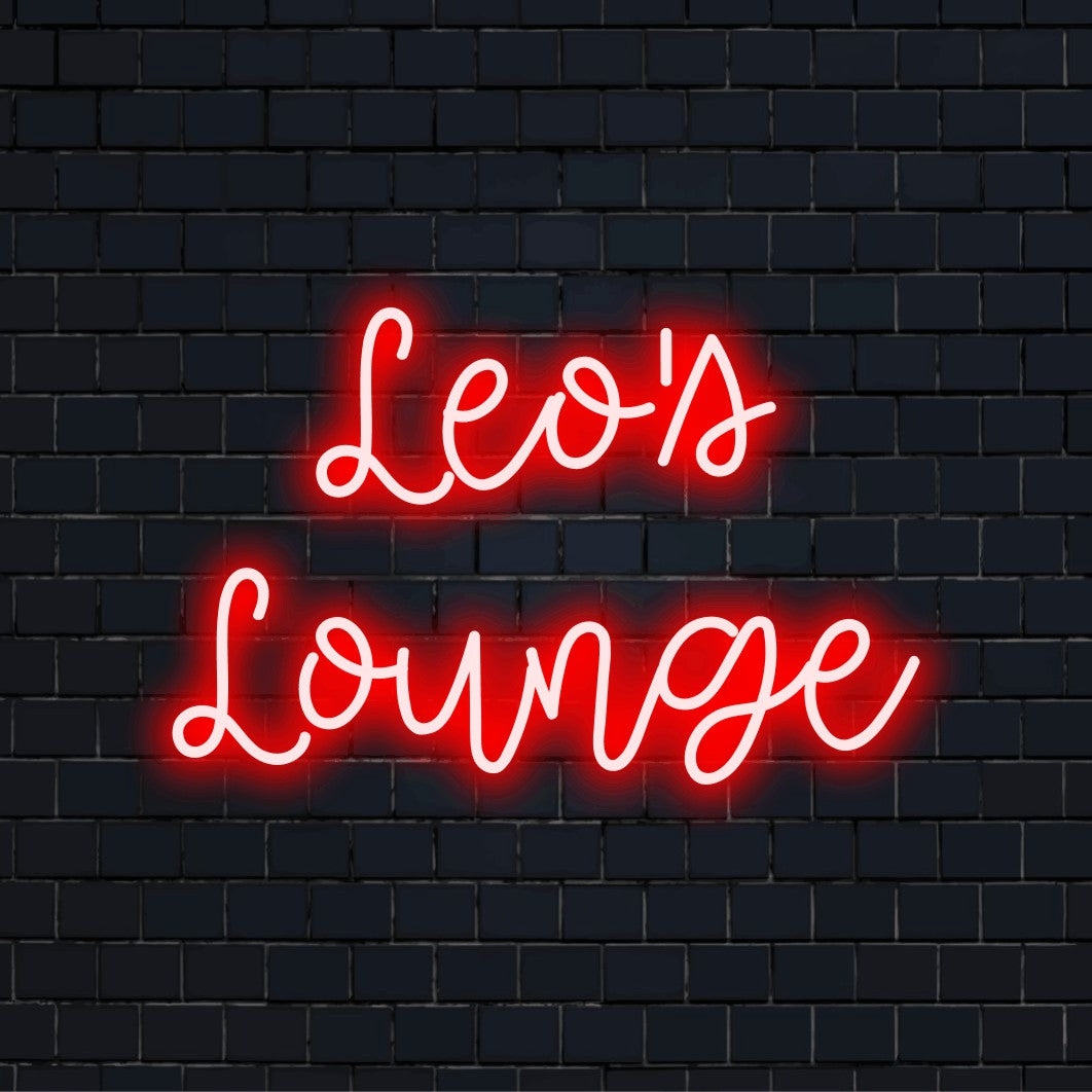 Leo_s Lounge Personalized LED Neon Sign, bright neon lettering against black brick wall