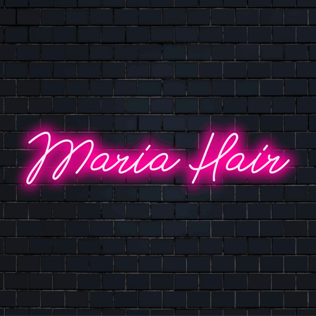 Maria Hair Personalized LED Neon Sign, glowing lettering against black brick wall
